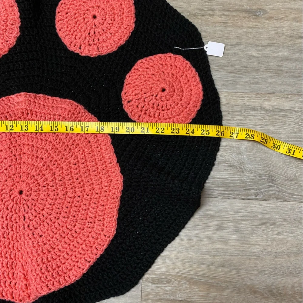 Black and Persimmon 26” handmade Crochet Paw Print Throw Rug
